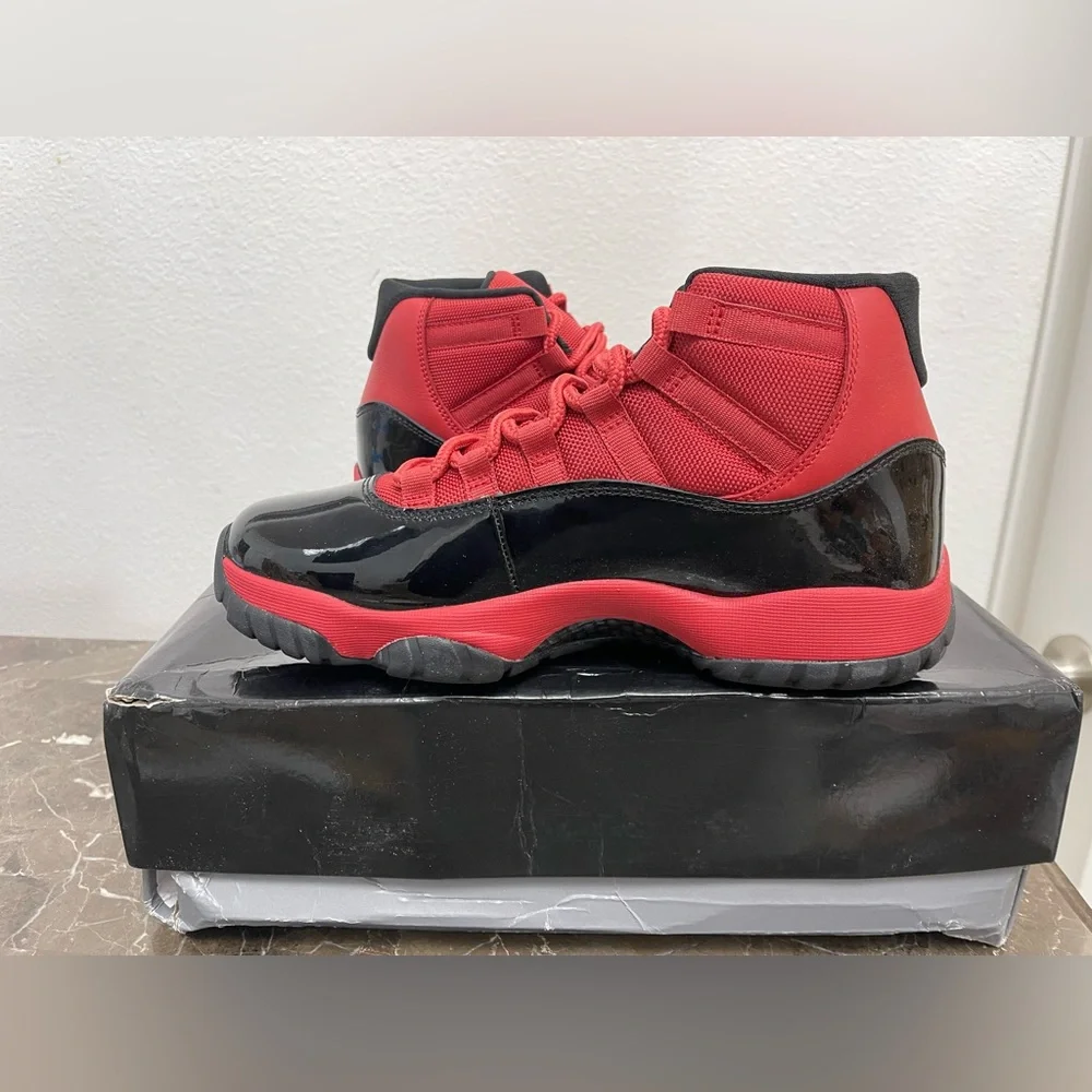 New! Unworn! Air Jordan 11 retro red and black men’s size 8